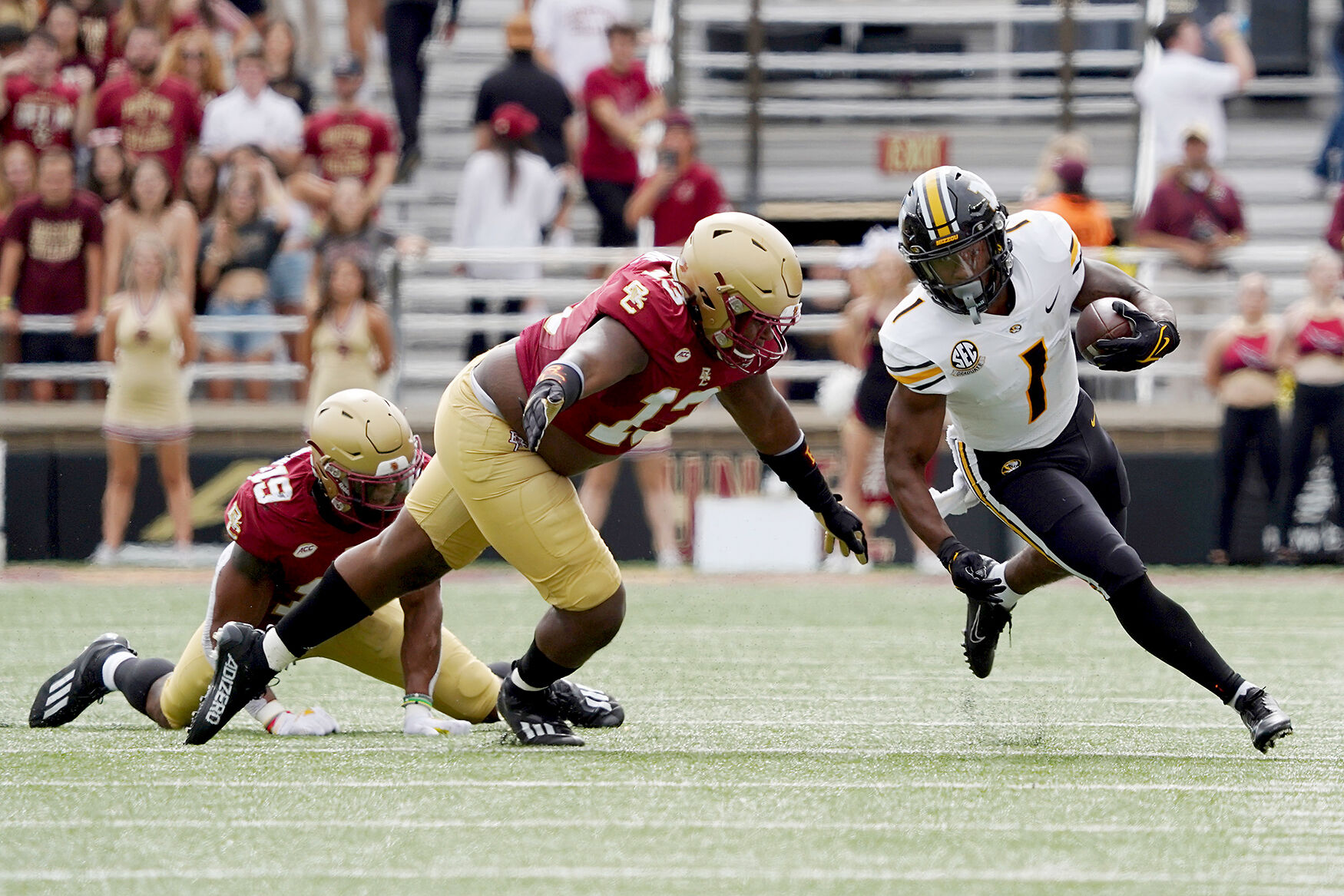 Tyler Badie rushes with the ball